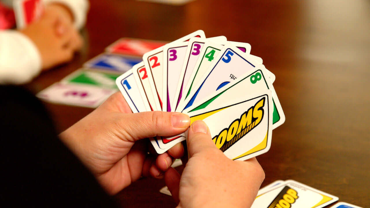 Players hand with multiple low cards and 1 SWOOP Card